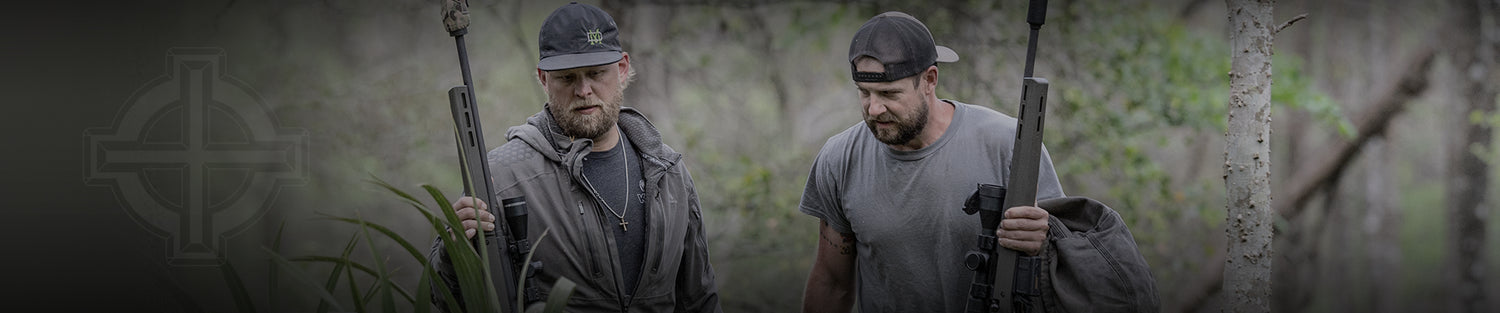 Two hunters in the woods