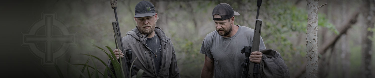 two hunters in the woods