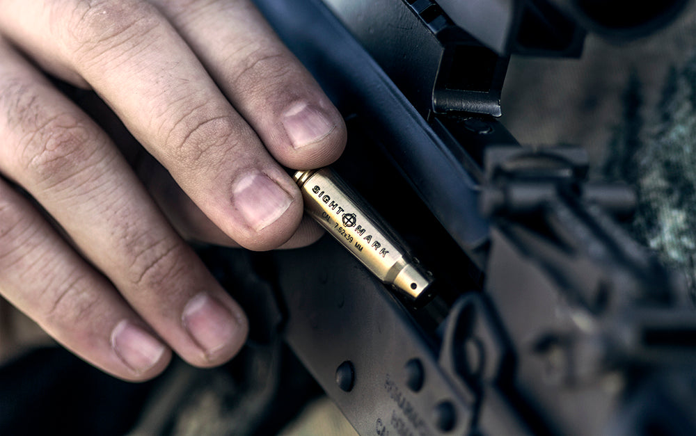 7.62x39 boresight installation demonstration showing proper rifle chamber insertion
